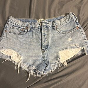 We the free  size 28 cut off shorts.